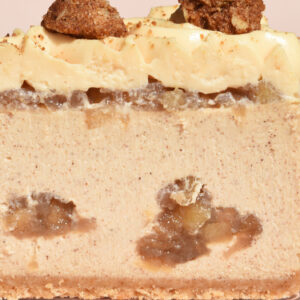 alt="Cinnamon Apple Filling, Brown Sugar Cheesecake, Cinnamon Crumble on top of Silky Caramel Ganache made in San Antonio, Texas"